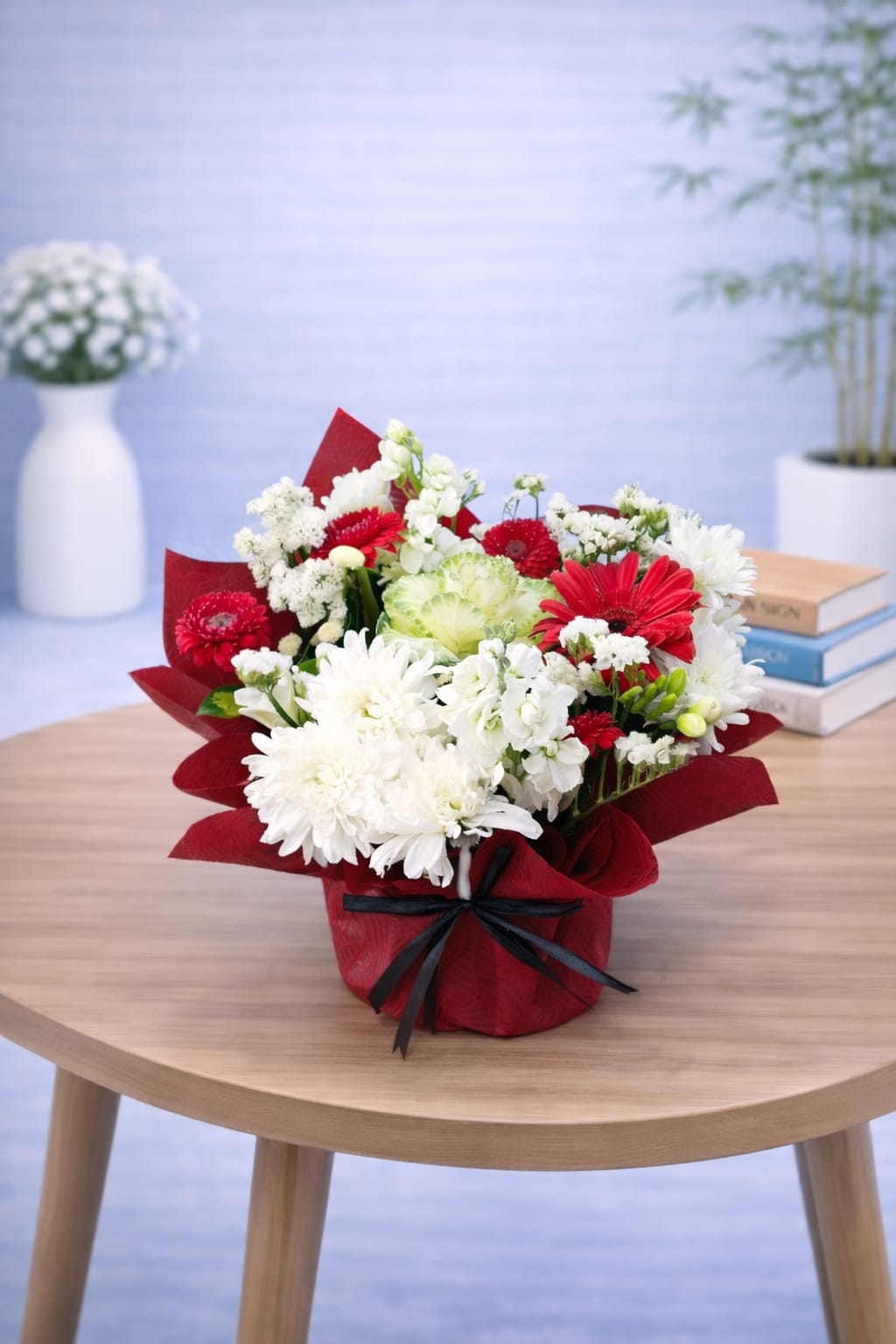 Paper rose base 14 - red gerbera and white chrysanthemum bouquet wrapped in burgundy paper with black ribbon