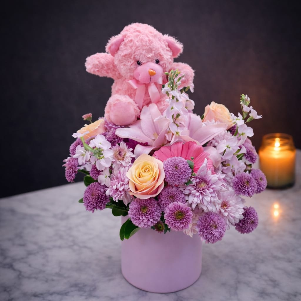 Flower box with pink teddy bear - purple chrysanthemums, peach roses and pink lily in a round pink velvet box